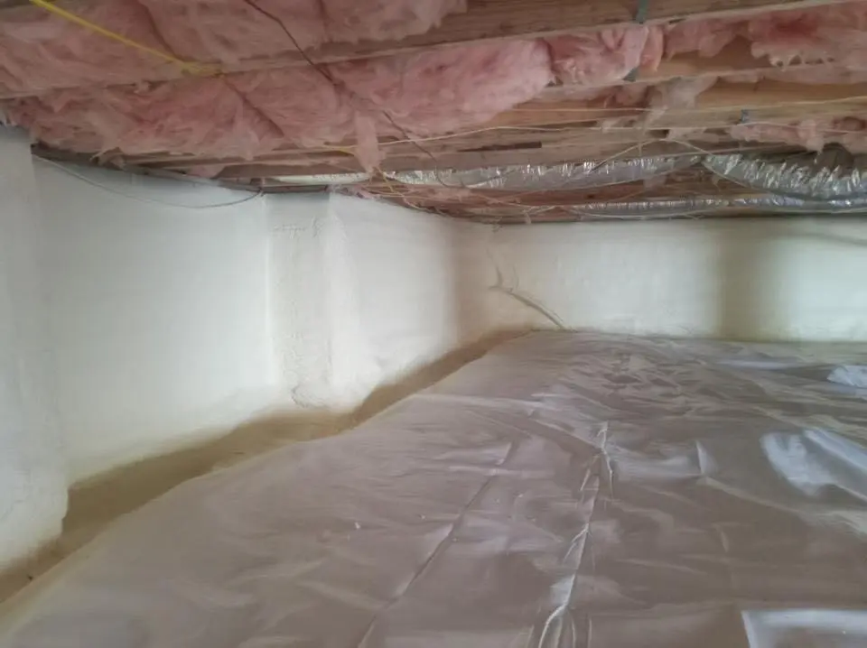 Crawl space encapsulation with closed-cell spray foam for Commercial Roof Restoration in Murray